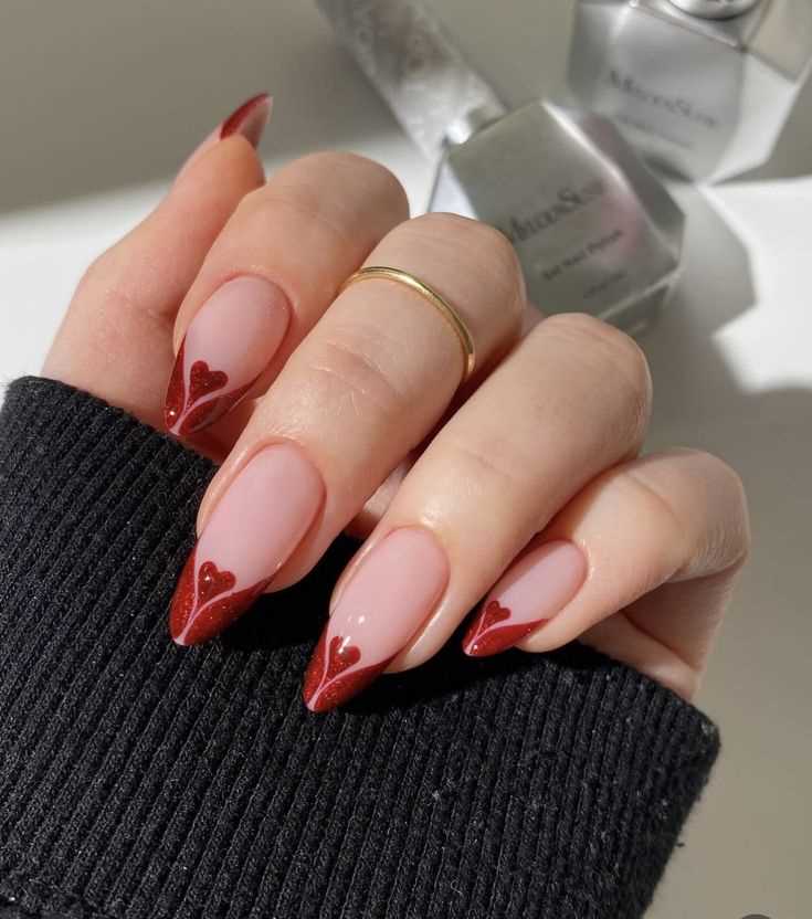 Heart-Shaped French Tips for 12 Classy French Tip Valentine’s Day Nails with a Romantic Twist.